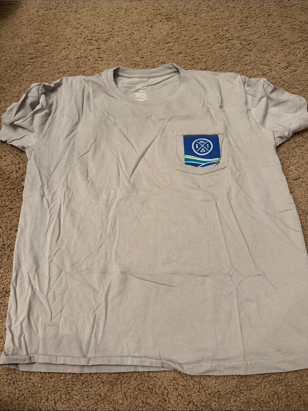 Women's Short Sleeve Pocket Tee in Light Gray with Blue Patch